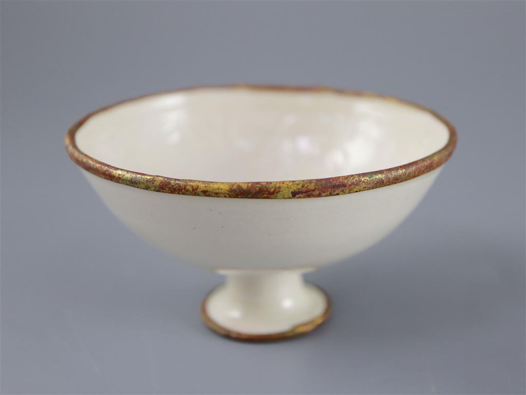 A Chinese Ding ware moulded stem bowl, Song-Jin dynasty or later, 10.4cm diameter